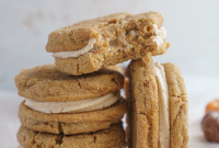 Pumpkin Sandwich Cookies with Spiced Cream Cheese Frosting