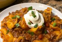 Cheesy Taco Tortellini Skillet -> Taco Tortellini Skillet with Melty Cheese and Taco Flavor