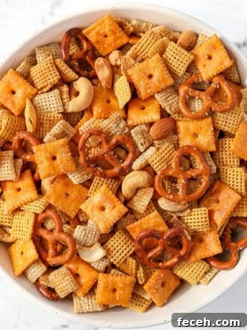 An overhead view of a bowl of Chex Mix.