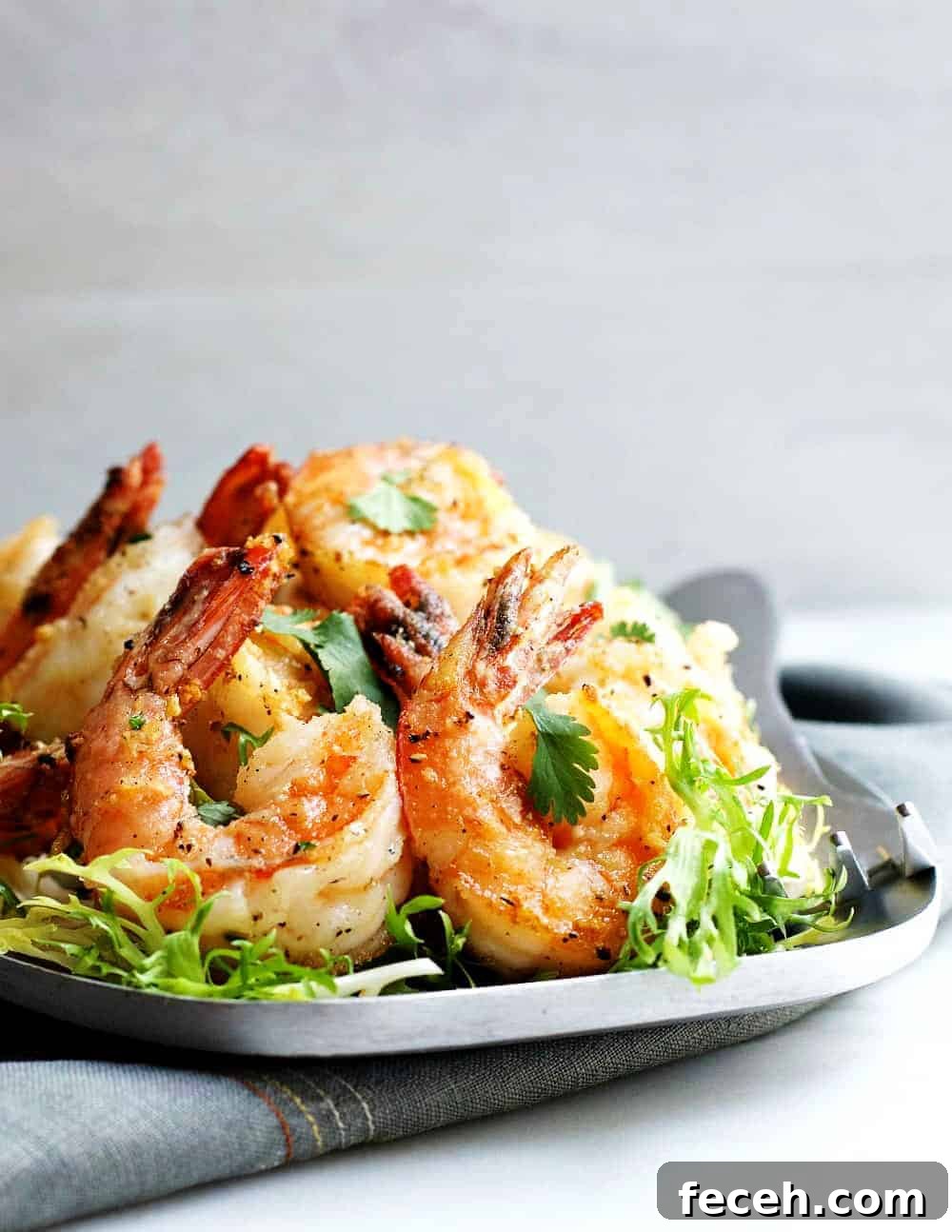 Crispy Salt and Pepper Shrimp Recipe with Garlic and Chili 2 Salt-and-Pepper-Shrimp-served-on-a-stainless-steel platter