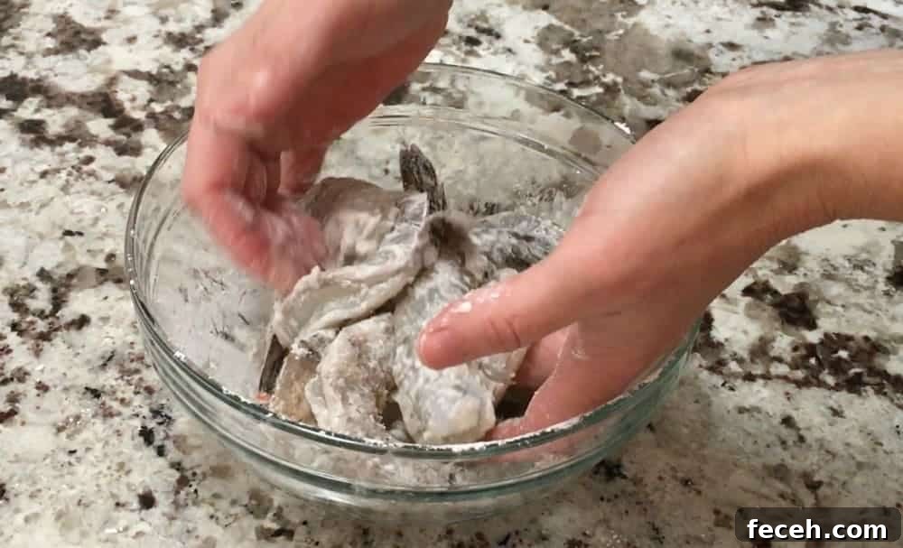 Crispy Salt and Pepper Shrimp Recipe with Garlic and Chili 8 Coating Raw Shrimp in Cornstarch