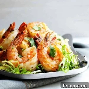 Crispy Salt and Pepper Shrimp Recipe with Garlic and Chili 13 Salt-and-Pepper-Shrimp-served-on-a-stainless-steel platter featured