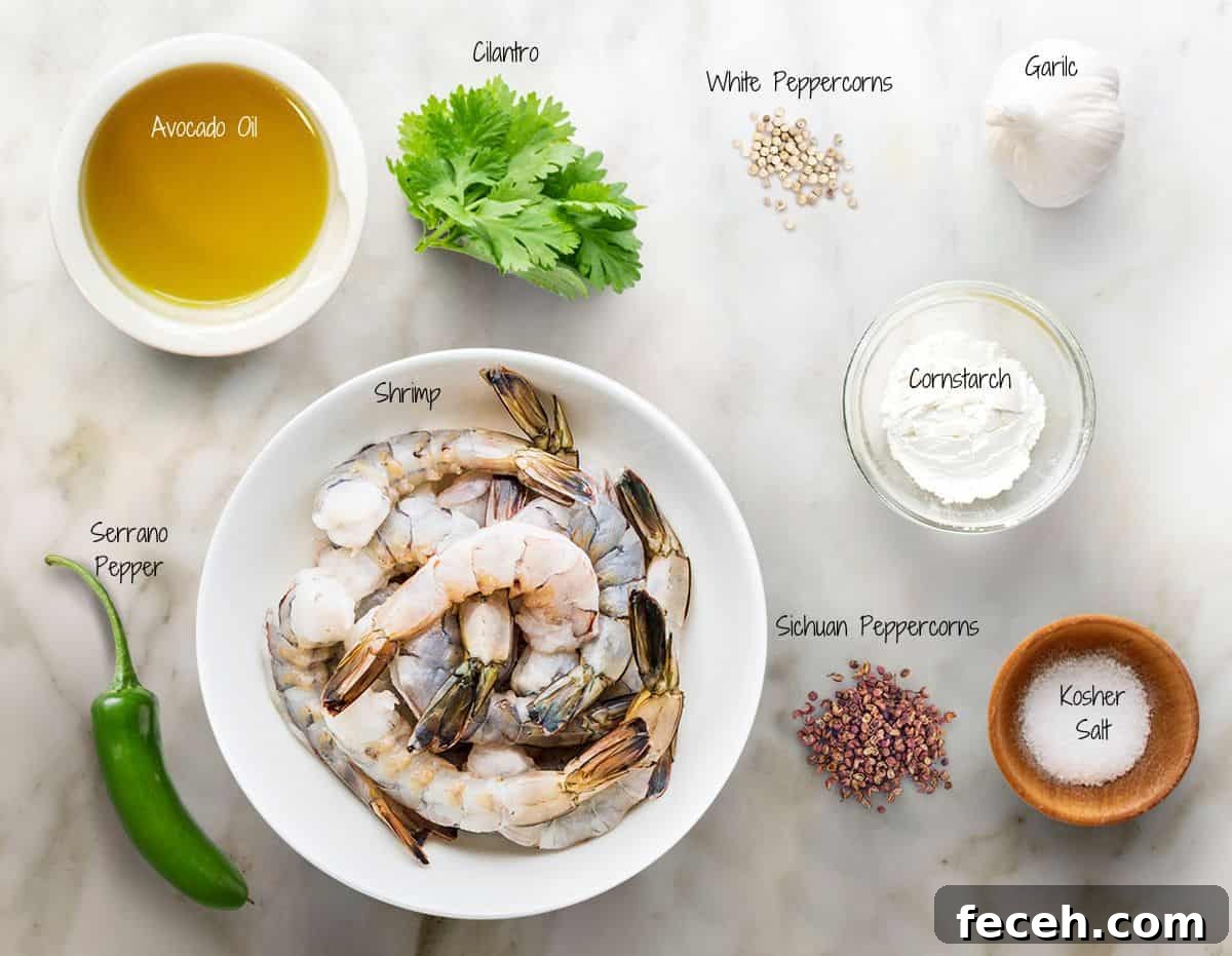 Crispy Salt and Pepper Shrimp Recipe with Garlic and Chili 3 Salt and Pepper Shrimp Ingredients on a white marble board.