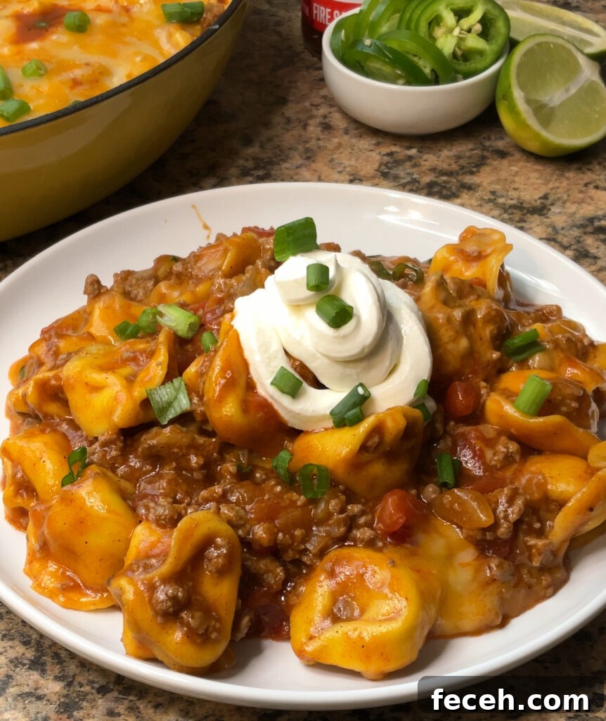 Cheesy Taco Tortellini Skillet -> Taco Tortellini Skillet with Melty Cheese and Taco Flavor 2 Cheesy Taco Tortellini Skillet