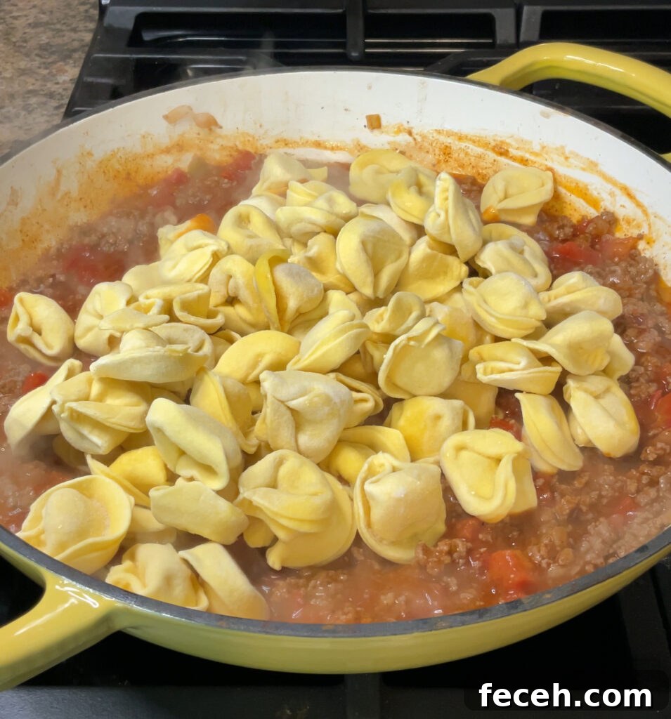 Cheesy Taco Tortellini Skillet -> Taco Tortellini Skillet with Melty Cheese and Taco Flavor 6 Cheesy Taco Tortellini Skillet