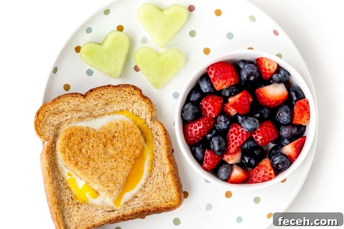 20 Fun Valentine's Breakfast Ideas for Kids 10 Heart shaped egg in toast.