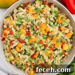 Chicken and mango salad served in a large bowl.