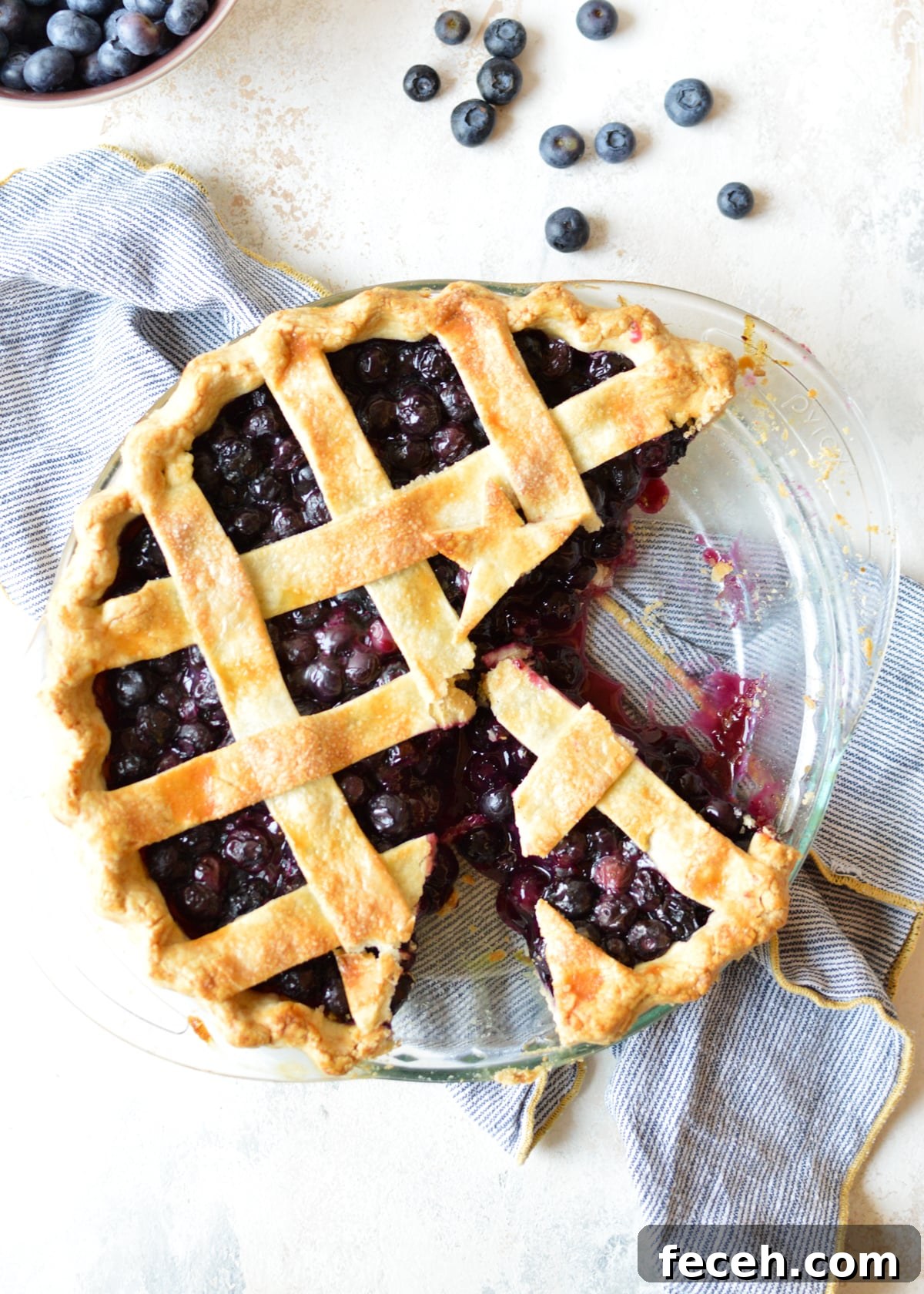 Gluten-Free Blueberry Pie Recipe: Flaky Crust & Fresh Filling 7 gluten free blueberry pie with a slice cut out