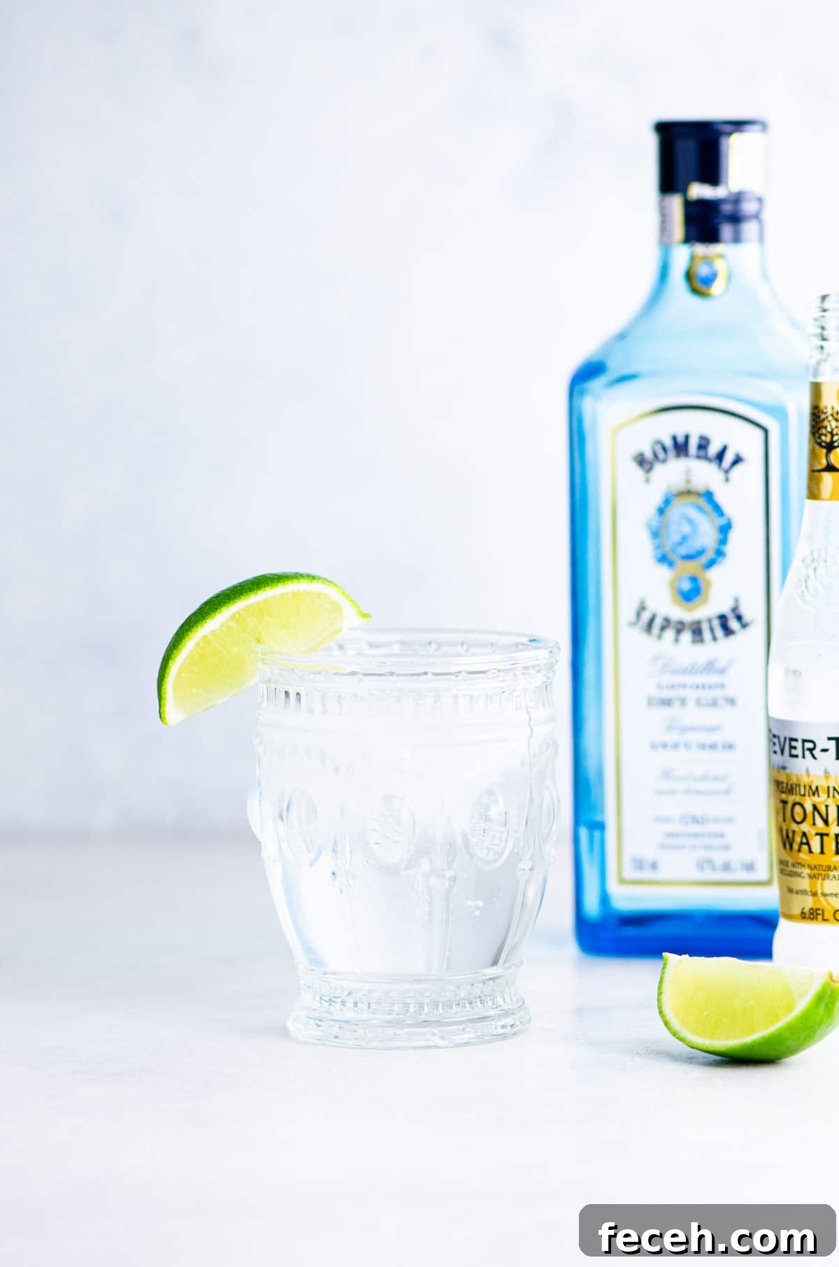 Gin and tonic with lime wedge and Bombay Sapphire