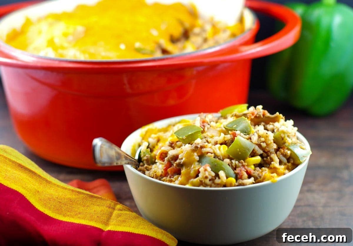 WW-Friendly Stuffed Green Pepper Casserole Recipe 2 bowl of ww stuffed green pepper casserole in front of a orange casserole dish in background