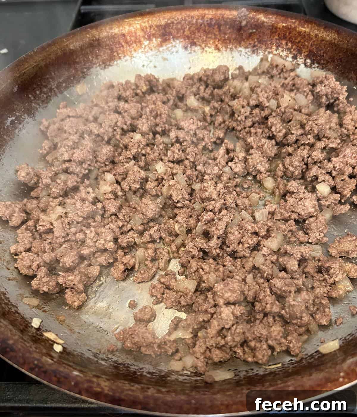 Hawaiian Roll Cheeseburger Sliders Recipe for Party Appetizers 6 Sautéed ground beef with onion and seasoning.