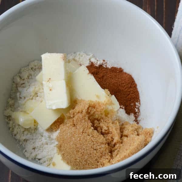 Cranberry, Nut & Pumpkin Quick Loaves: Fall Breakfast Recipe 2 flour, butter, sugar, cinnamon in a bowl