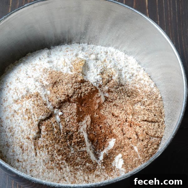 Cranberry, Nut & Pumpkin Quick Loaves: Fall Breakfast Recipe 5 dry ingredients in a bowl.