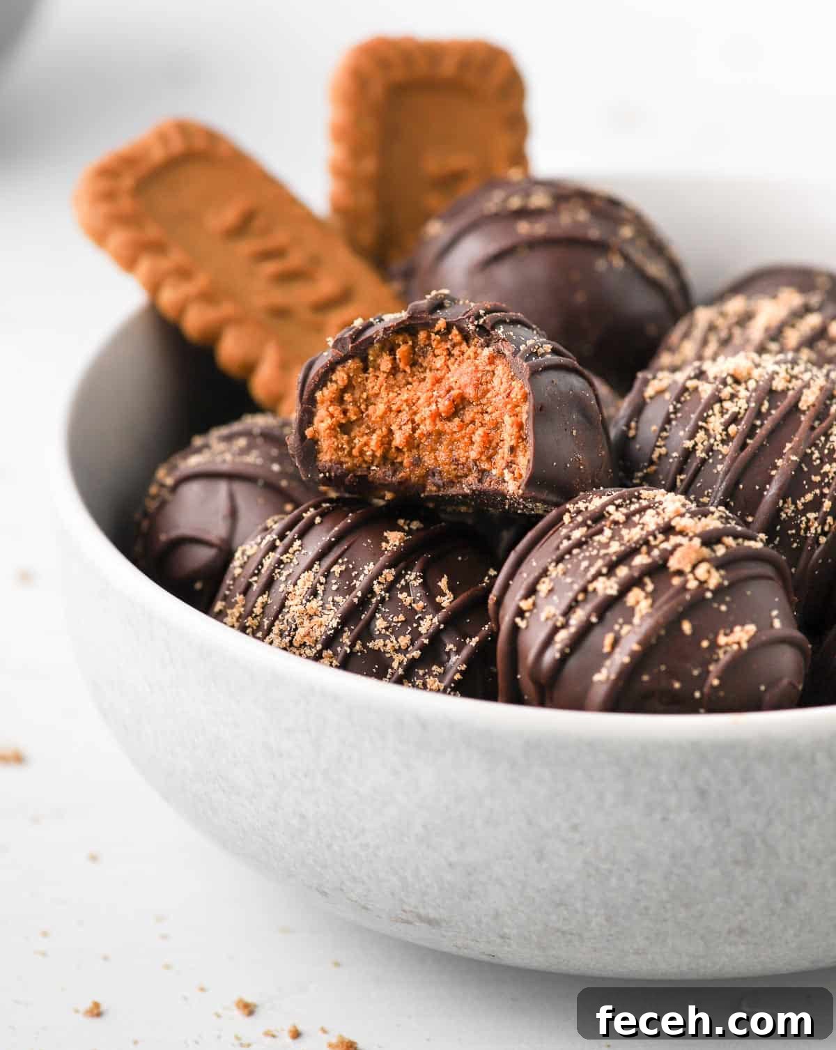 Biscoff Cookie Butter Truffles Recipe: 3-Ingredient No-Bake Treat 4 Biscoff Balls in a grey bowl.