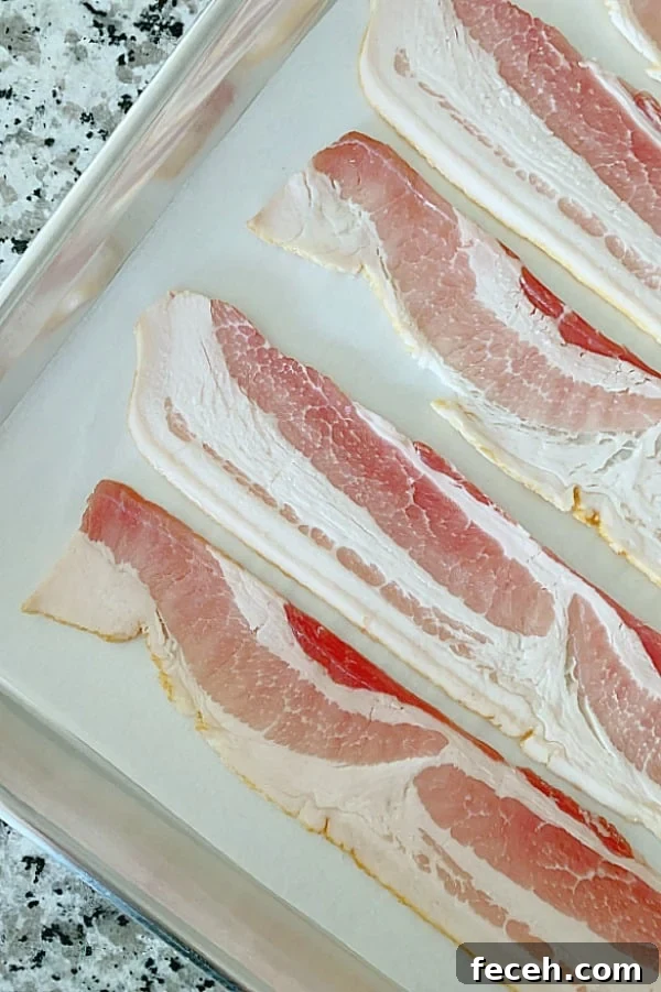 showing how to bake bacon on sheet pan with parchment paper