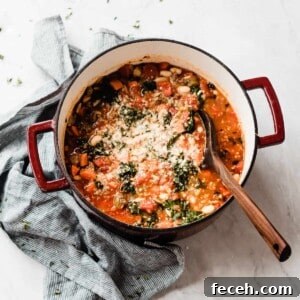 A large dutch oven full of the minestrone soup.