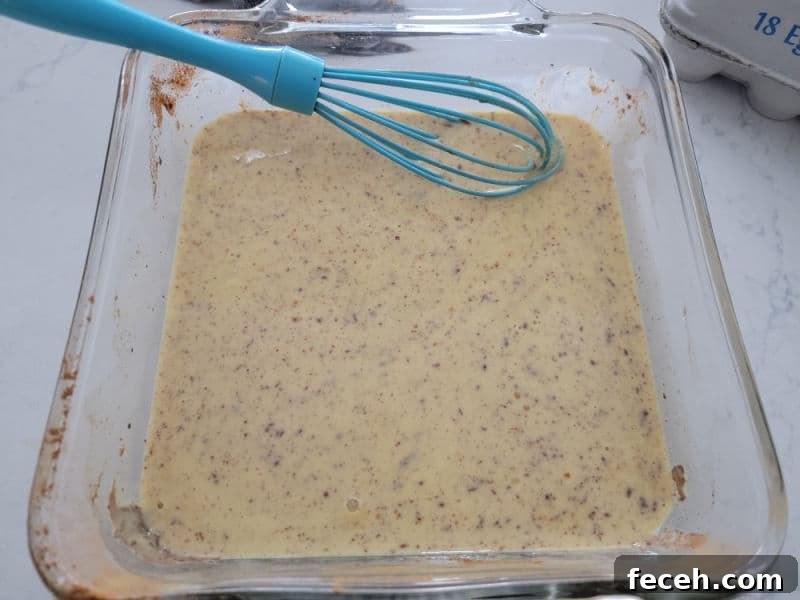 Eggnog french toast coating in a pan