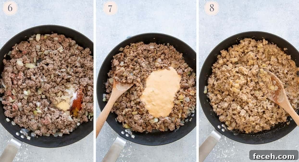 ground beef being fried in a skillet then tossen with special sauce for burger casserole recipe