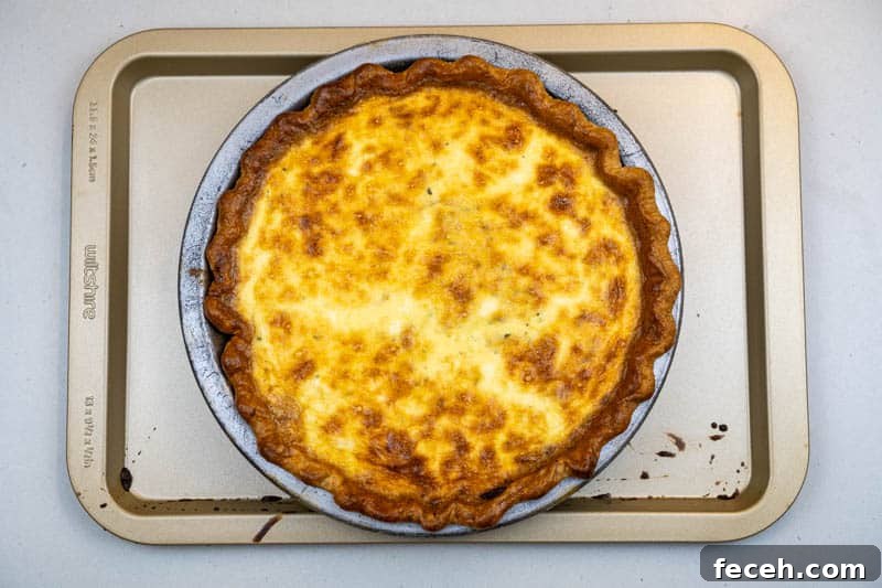 Removing the quiche from the oven