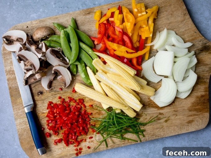 Chopped vegetables on a board for a stir fry