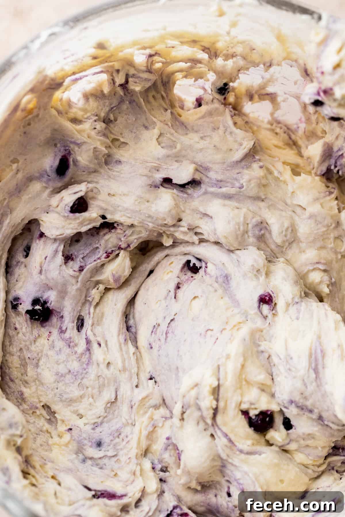 Cake batter in a glass bowl.