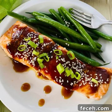 plated teriyaki salmon with green beans.