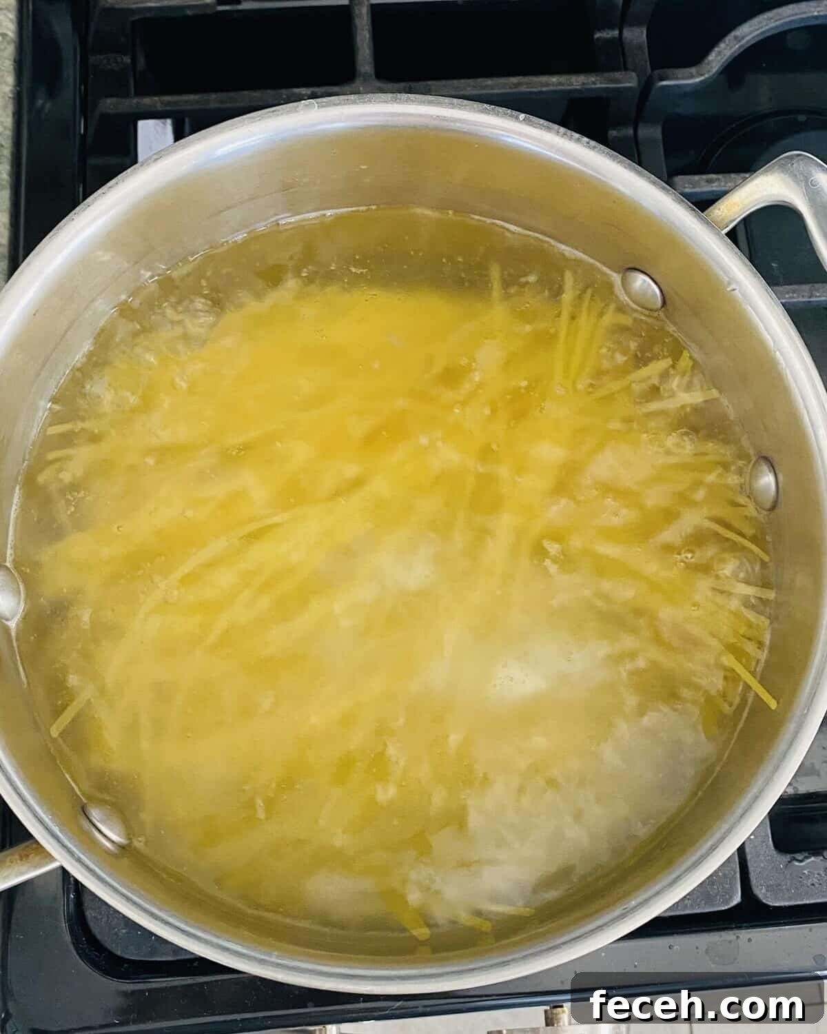 Boiling pasta.