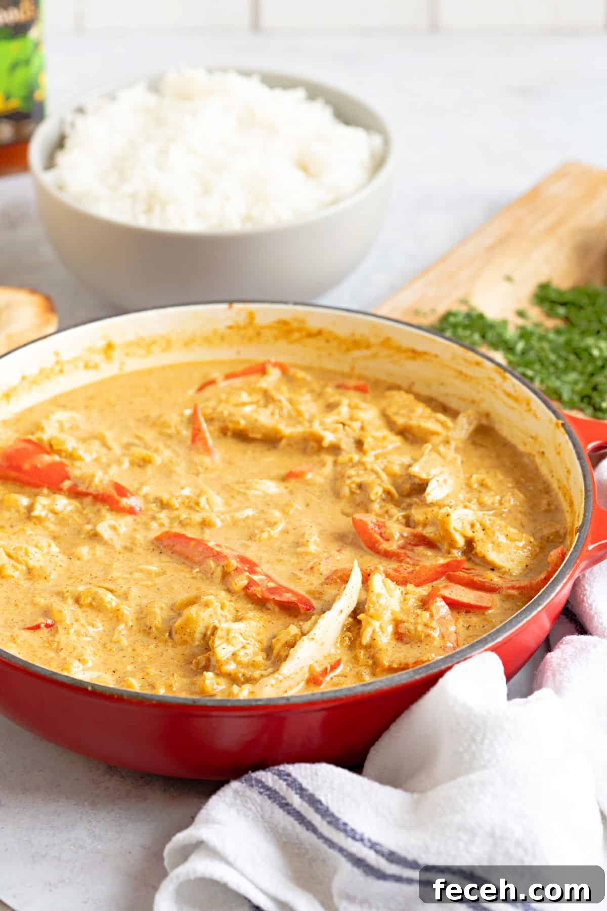 Revived Leftover Chicken Curry: Flavorful Makeover Recipe 11 Leftover chicken and vegetable curry with a bowl of rice.
