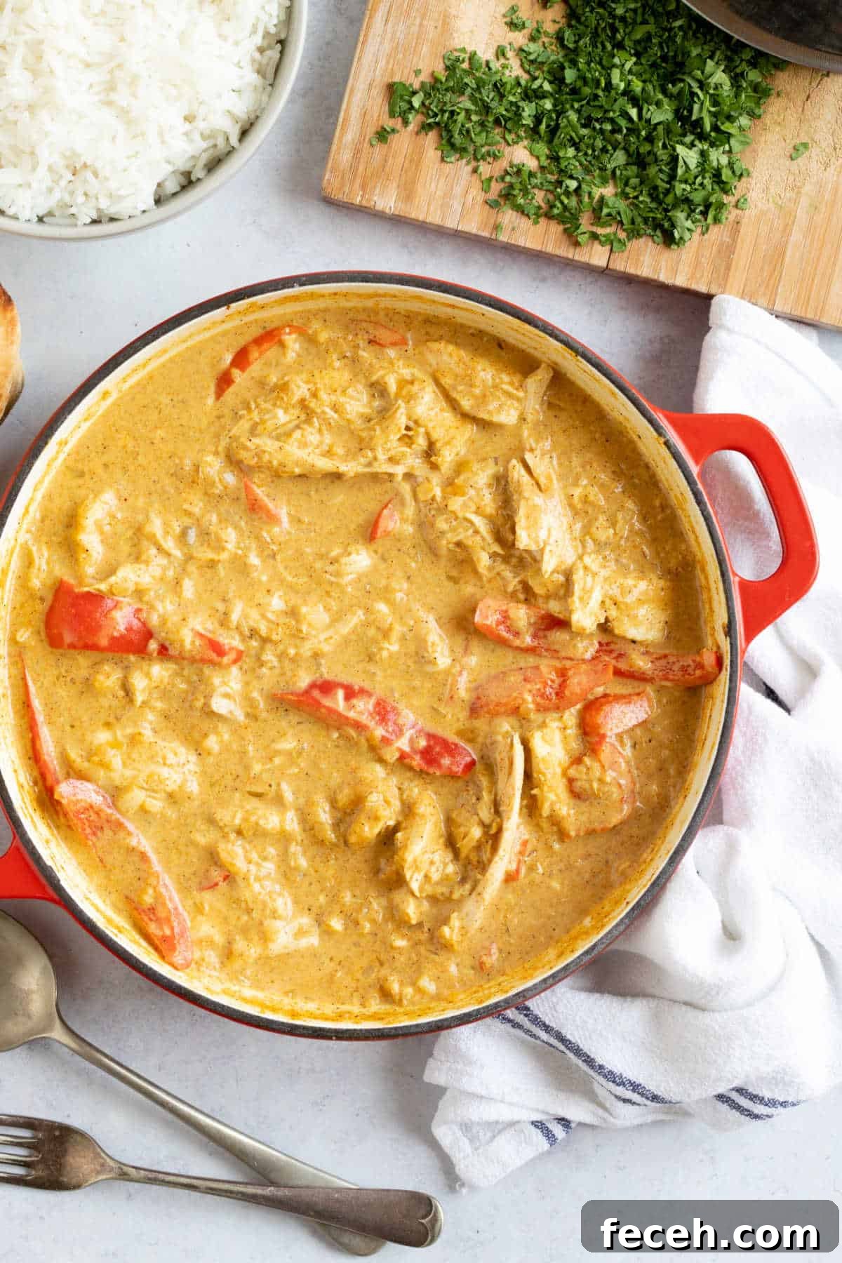Revived Leftover Chicken Curry: Flavorful Makeover Recipe 5 Leftover chicken and red pepper curry in a red pan.