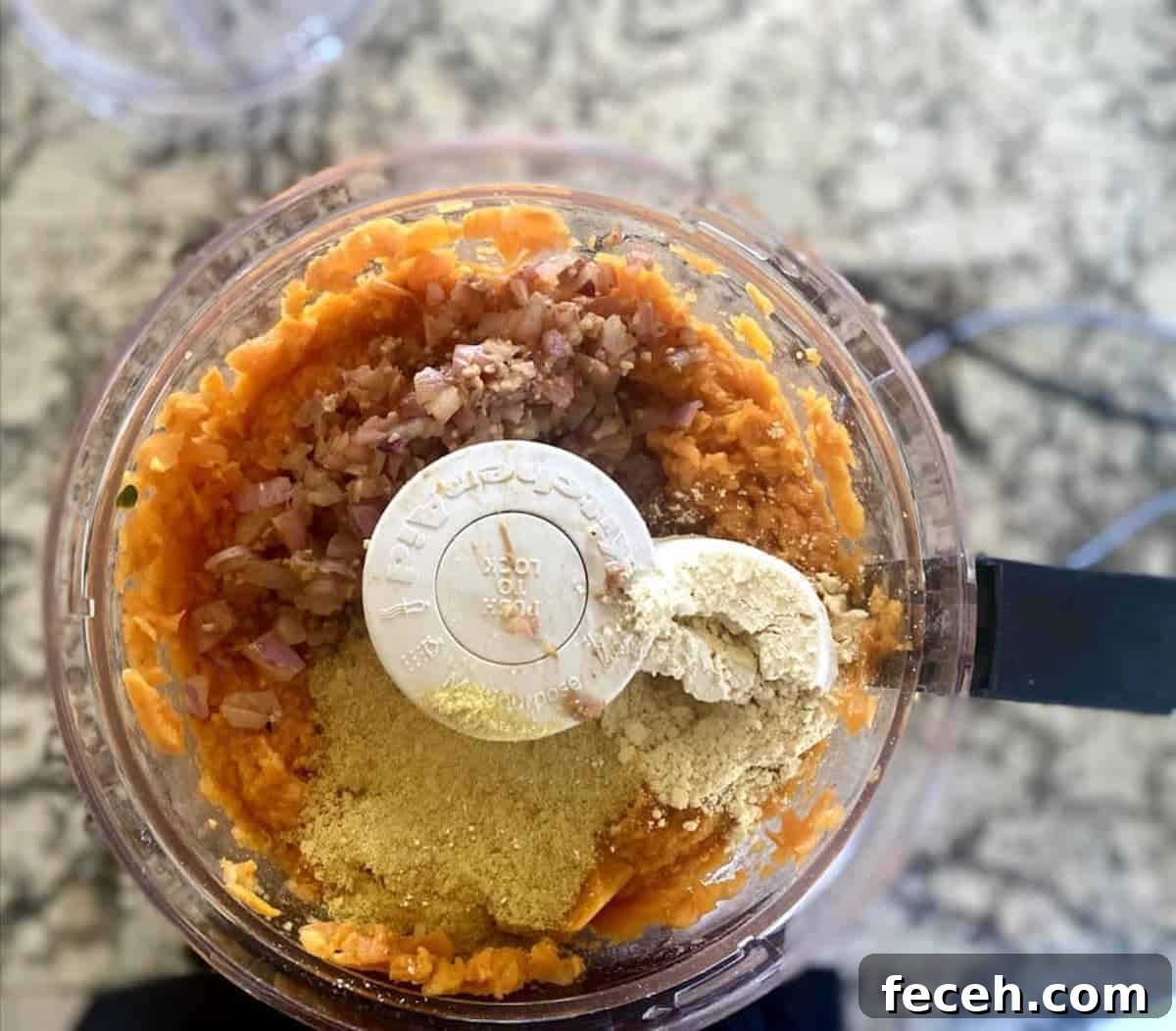 All the ingredients in a large food processor bowl 