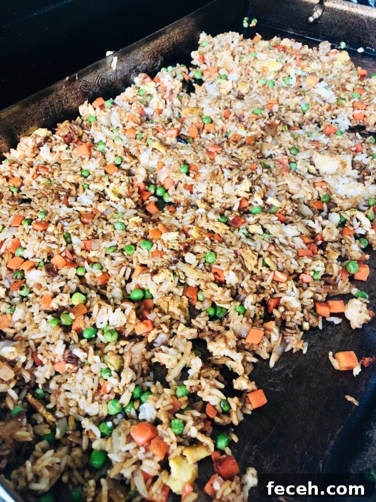 Hibachi-Style Shrimp Fried Rice Recipe for Flavorful Weeknights 7 fried rice on flat top