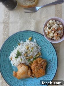 15 Global Soups and Hearty Stews to Warm Any Night 6 Greek-style chicken stew with rice on a blue plate.
