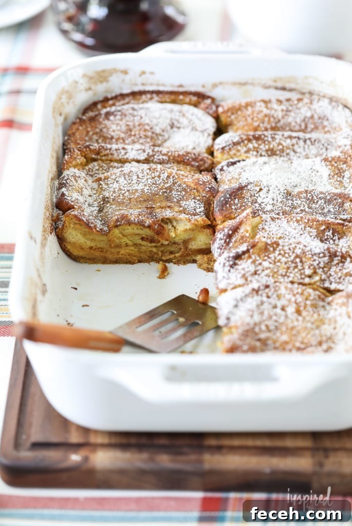 pumpkin french toast casserole with a couple pieces removed.