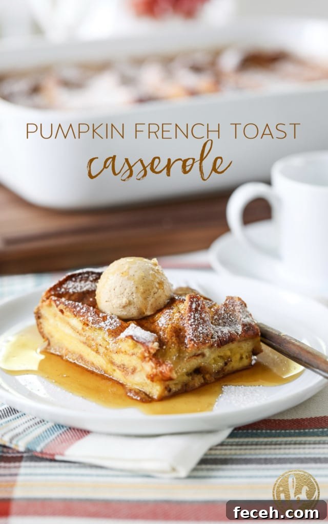 pumpkin french toast casserole served on a plate with maple syrup.