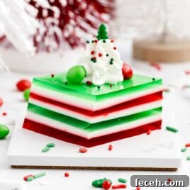 a close up shot of Holly Jolly Jello Shots on a stand