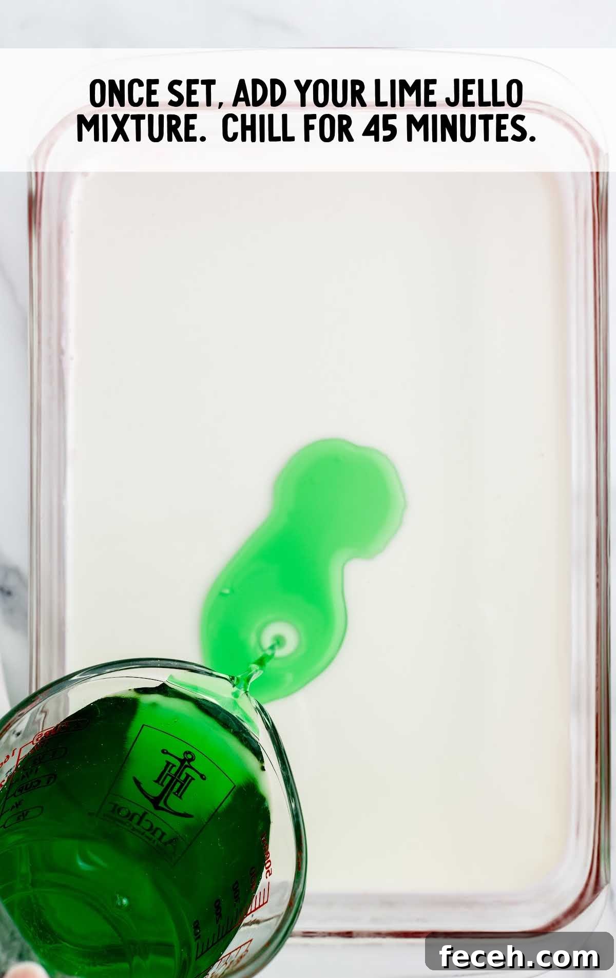 lime jello mixture added in a baking dish