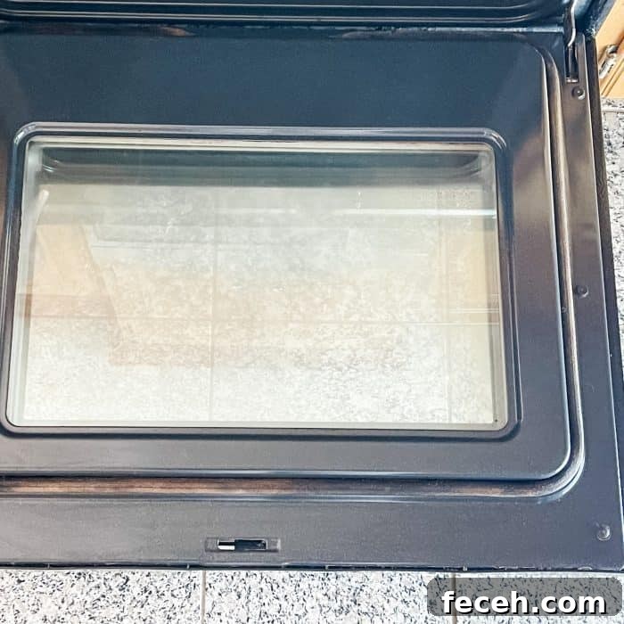 oven door is shiny and crystal clear after cleaning it with essential oils