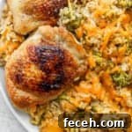 Plate of cheesy chicken broccoli and rice.