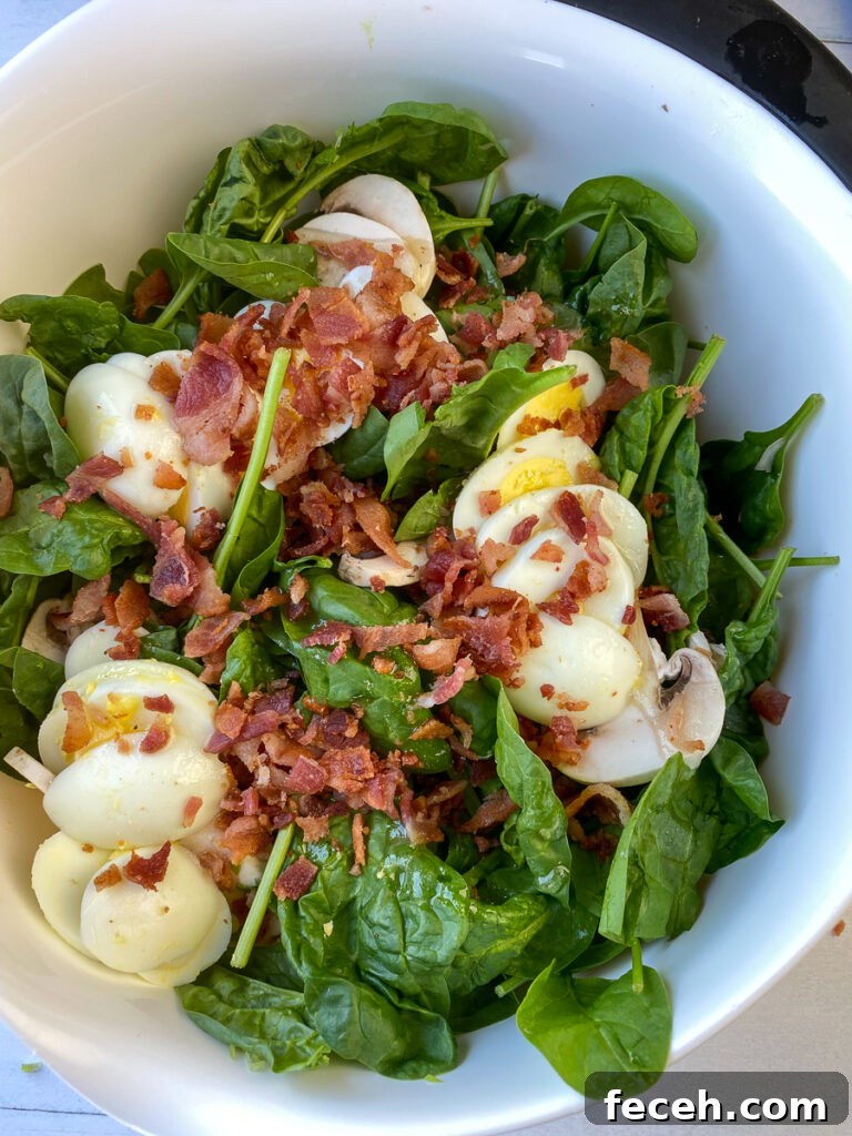 Spinach Salad with Bacon, Mushrooms, and Warm Balsamic Dressing 9 Freshly chopped bacon sprinkled on top of spinach and mushroom salad recipe