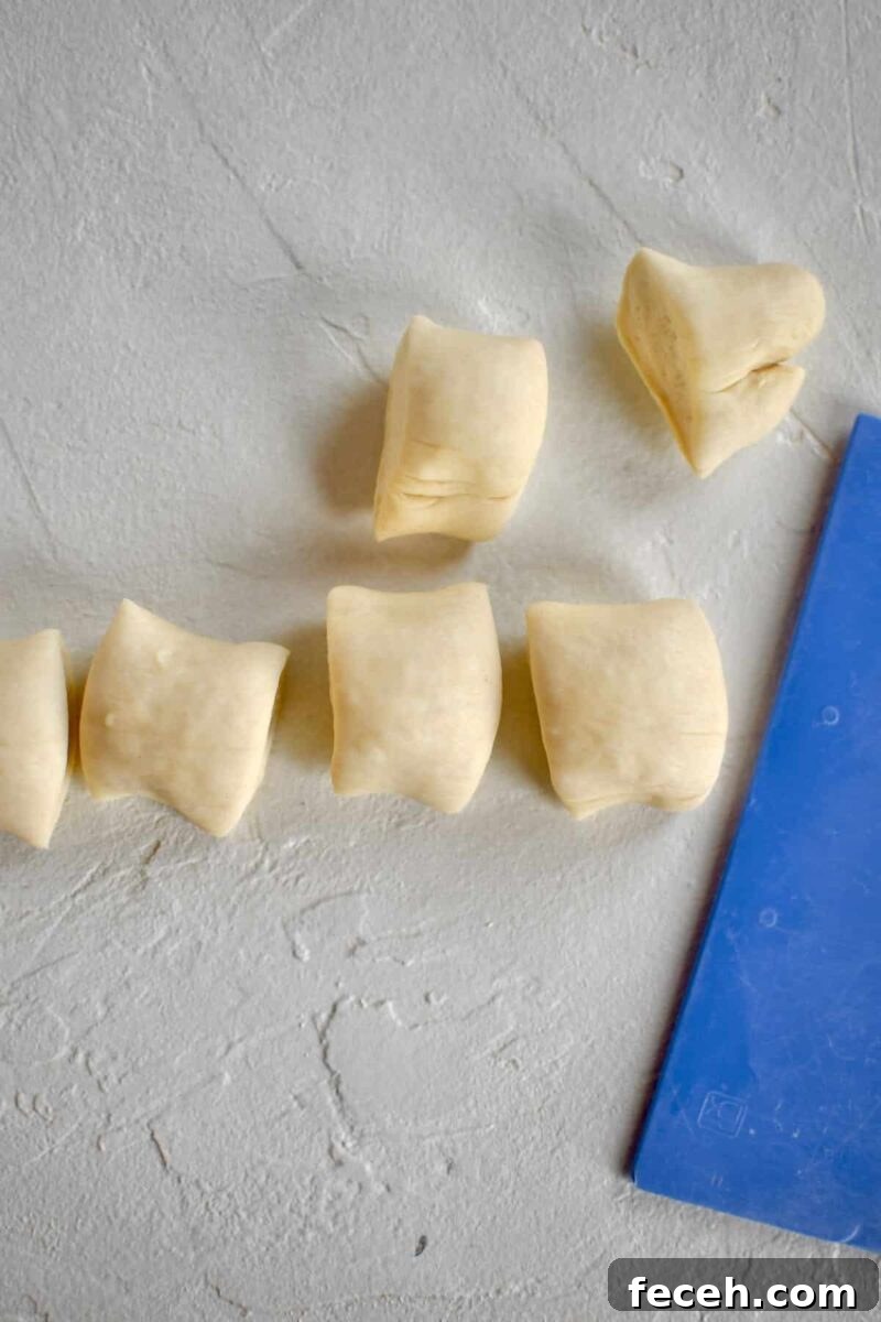 Soft Homemade Pretzel Bites Recipe for Perfect Party Snacks 10 Proved dough rolled out and cut into pretzel bites.