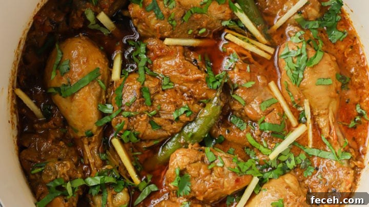 Achari Chicken in a white pot