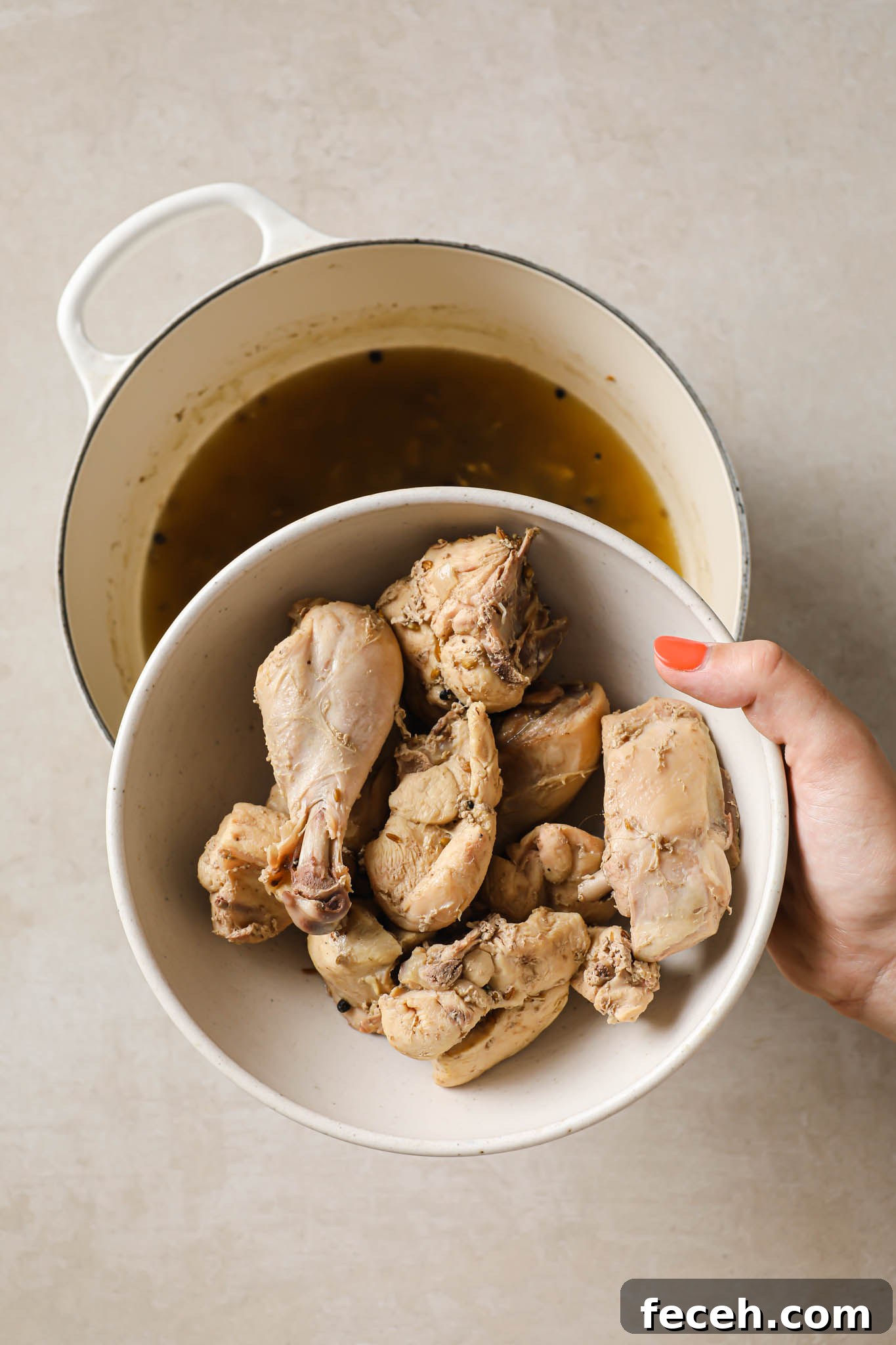 Chicken separated from broth.