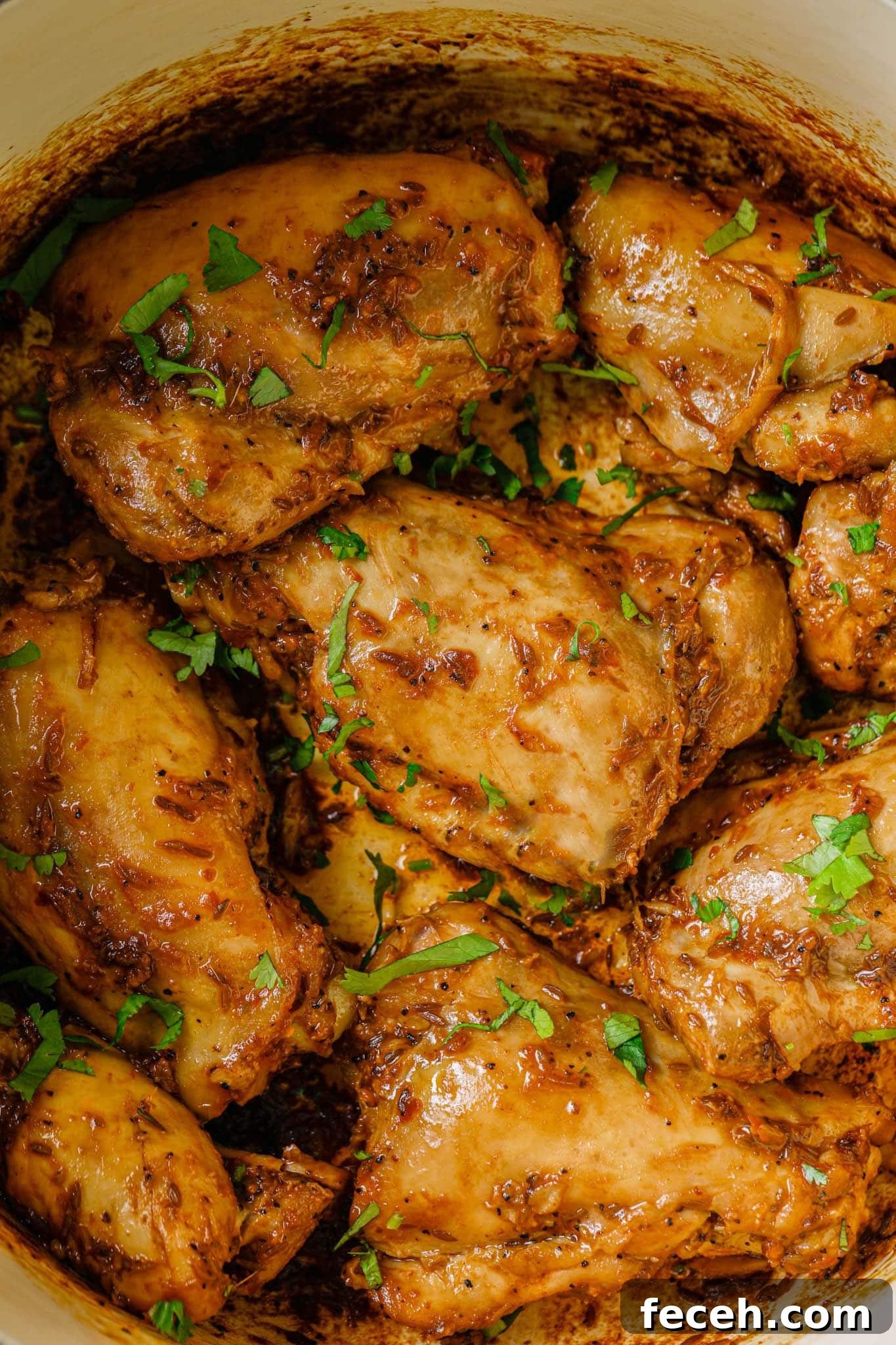 Cooked Bone-in Chicken Thighs garnished with cilantro
