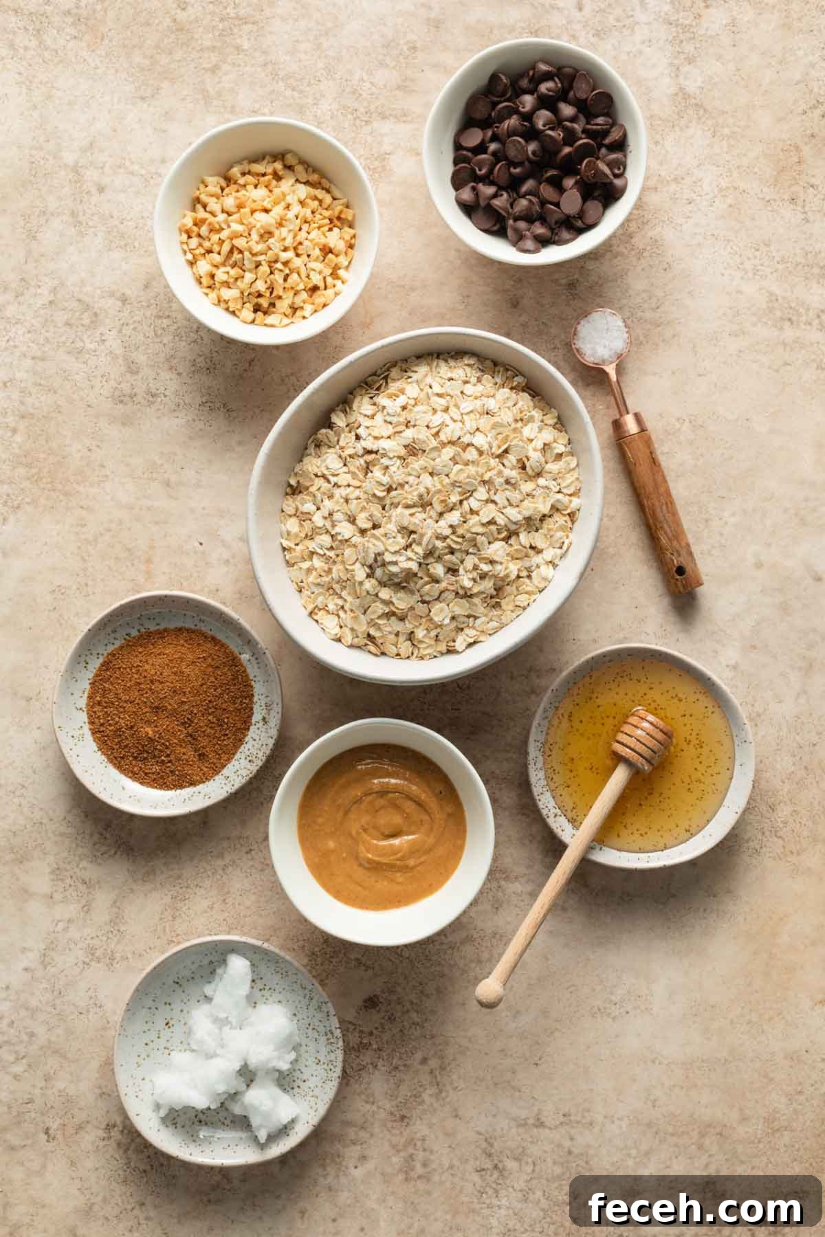 Ingredients to make peanut butter granola arranged individually.