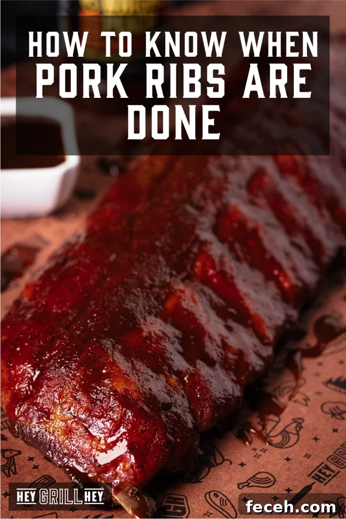 Pork ribs resting on peach butcher paper with text overlay - How to Know When Pork Ribs are Done.