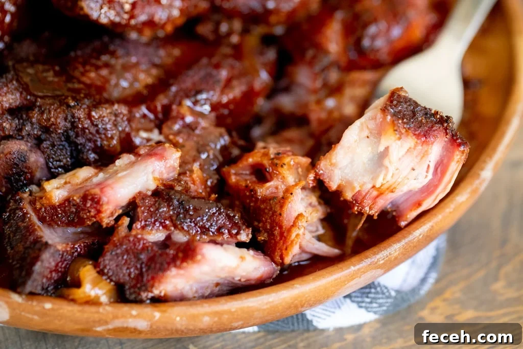Smoked country style ribs in a wooden bowl.