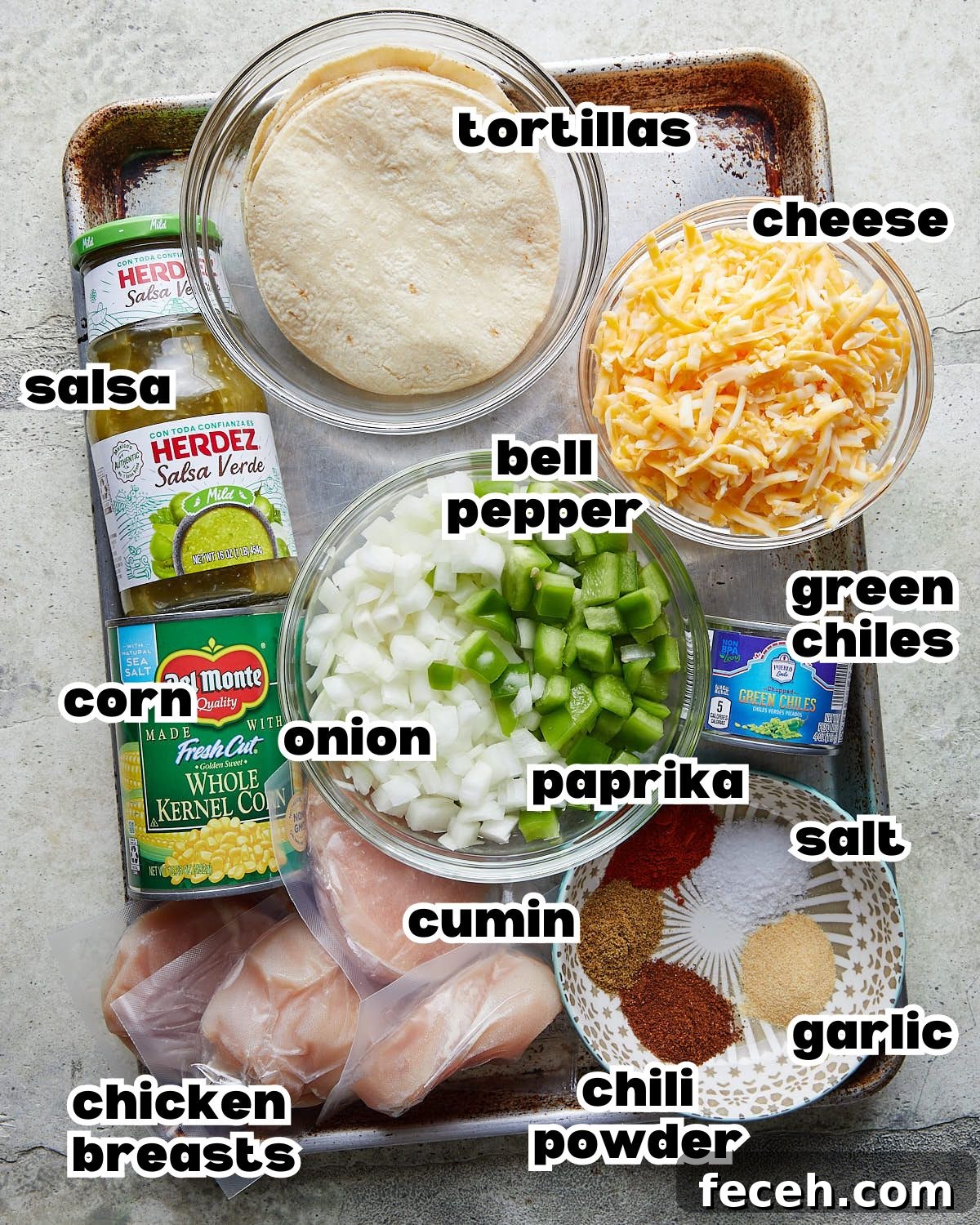 Slow Cooker Chicken Enchilada Casserole Recipe for Busy Nights 3 Overhead image of ingredients needed to make slow cooker chicken enchilada casserole.