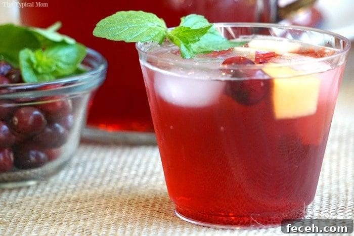 Sparkling cranberry sangria mocktail or cocktail recipe that looks and tastes amazing! sparkling cranberry sangria mocktail