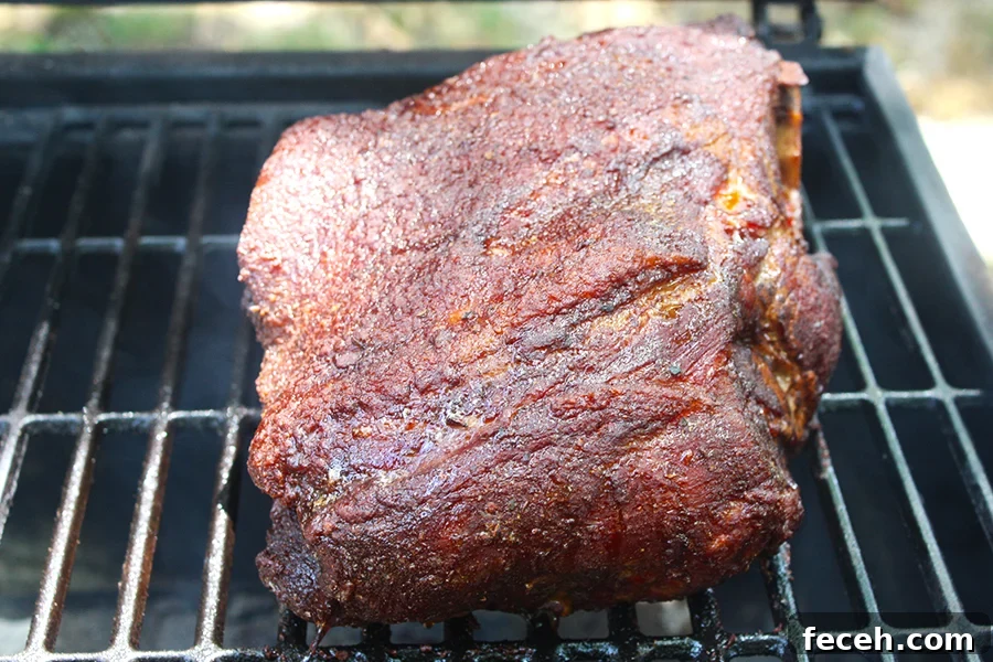 Smoked Double Bone-In Pork Chops with Bold Smoky Flavor 11 Smoked Pork butt on a smoker
