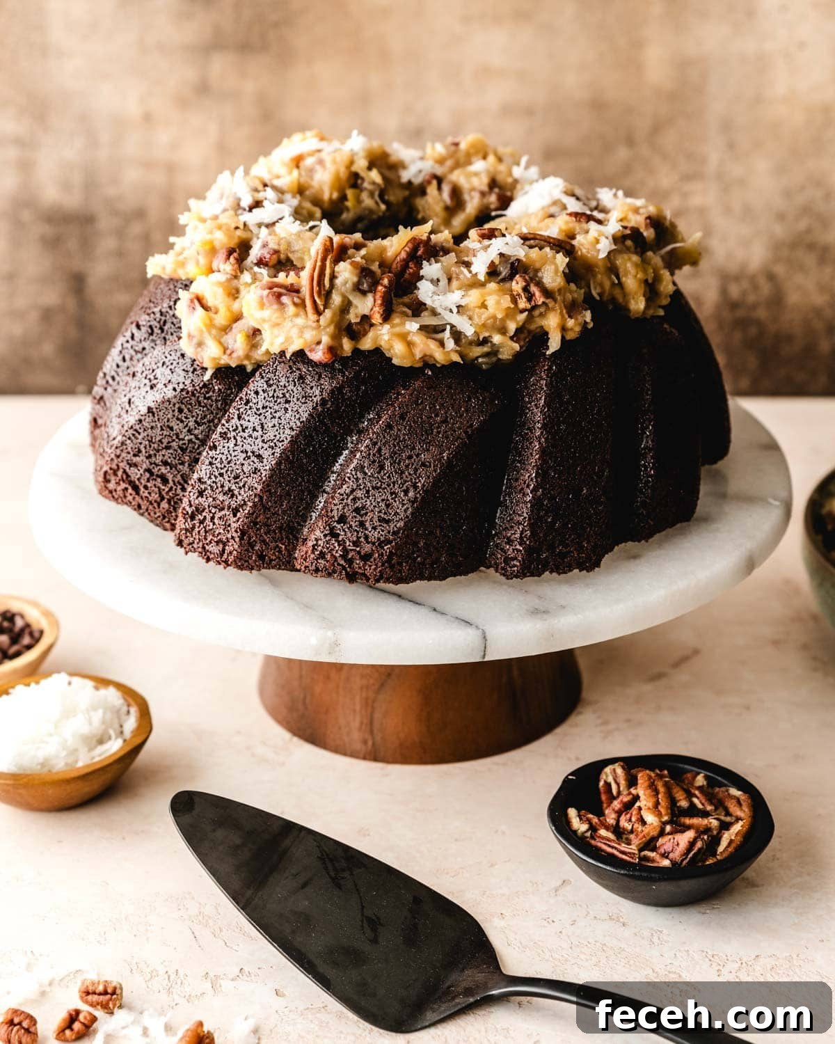 Top German Chocolate Pound Cake with Pecan Coconut Frosting.